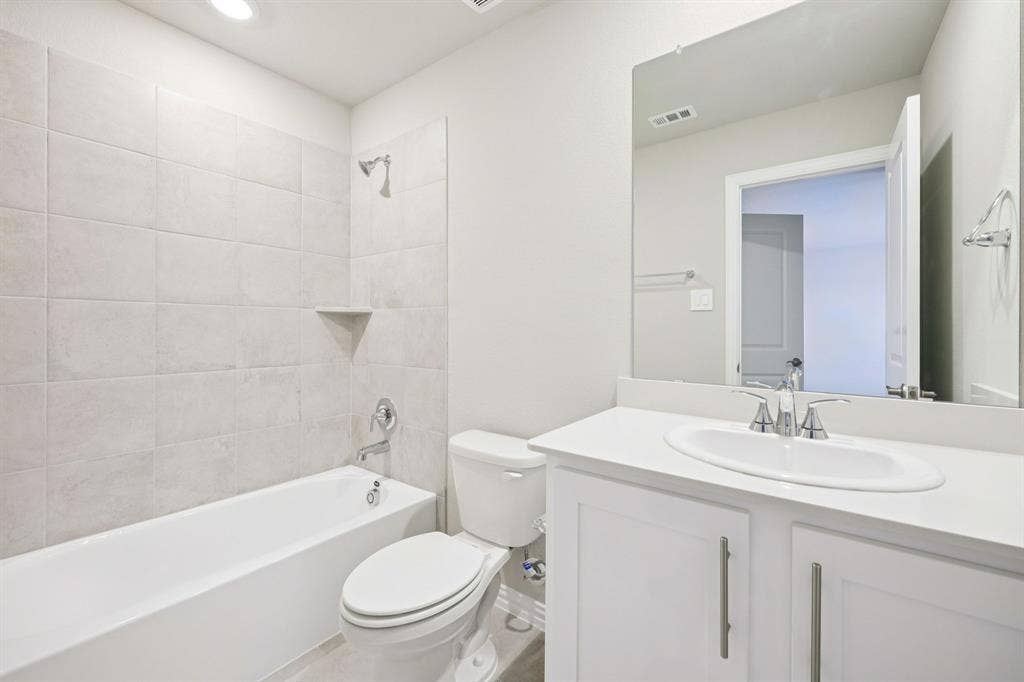 1125 Windflower Drive, Princeton, TX 75407 Photo is not of the actual home, but is an inspirational photo of builder’s model home and may depict options, furnishings, and/or decorator features that are not included.