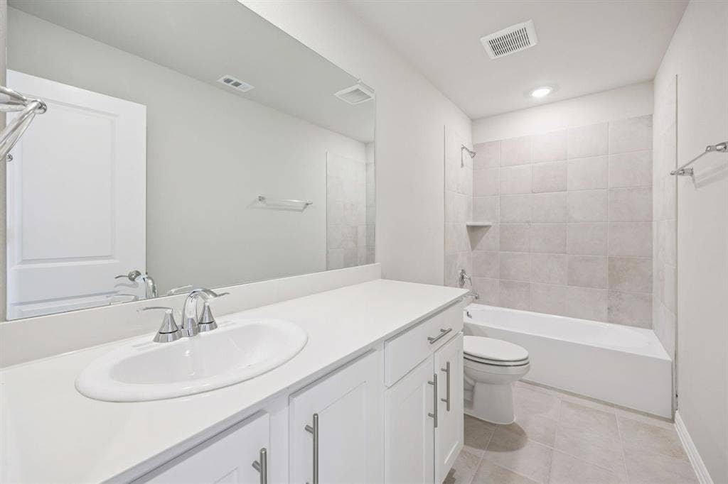 1125 Windflower Drive, Princeton, TX 75407 Photo is not of the actual home, but is an inspirational photo of builder’s model home and may depict options, furnishings, and/or decorator features that are not included.