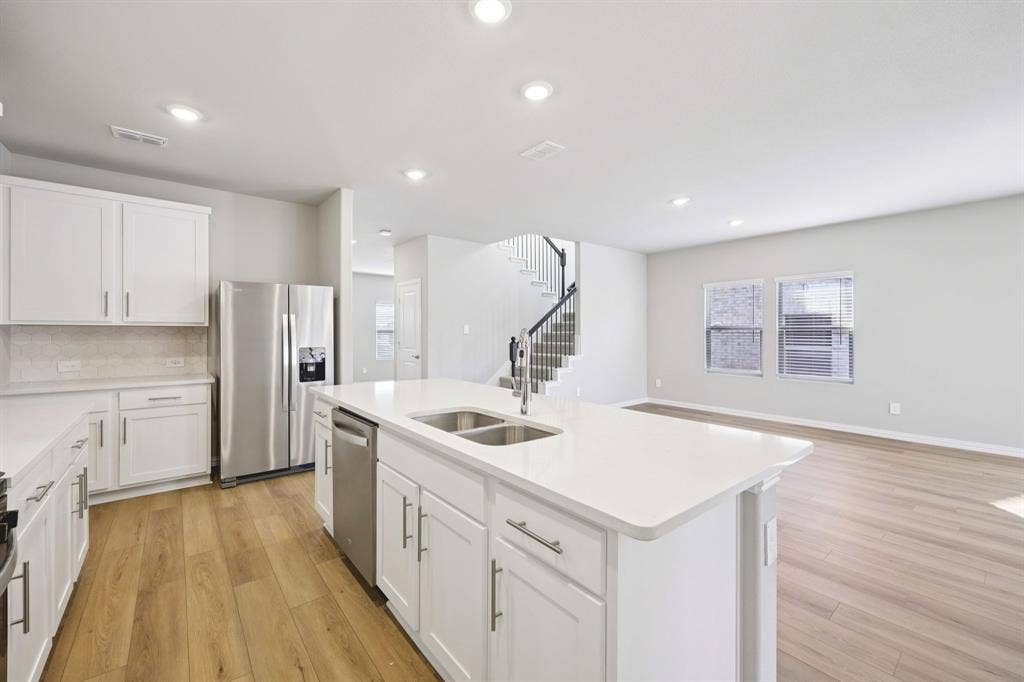 1125 Windflower Drive, Princeton, TX 75407 Photo is not of the actual home, but is an inspirational photo of builder’s model home and may depict options, furnishings, and/or decorator features that are not included.