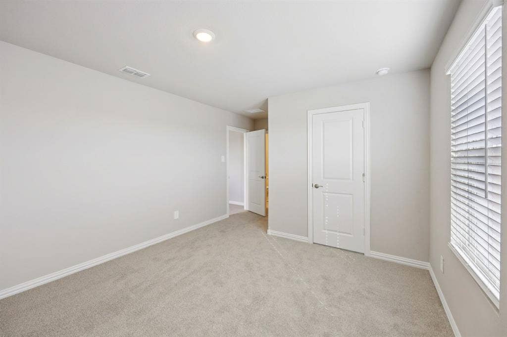 1125 Windflower Drive, Princeton, TX 75407 Photo is not of the actual home, but is an inspirational photo of builder’s model home and may depict options, furnishings, and/or decorator features that are not included.