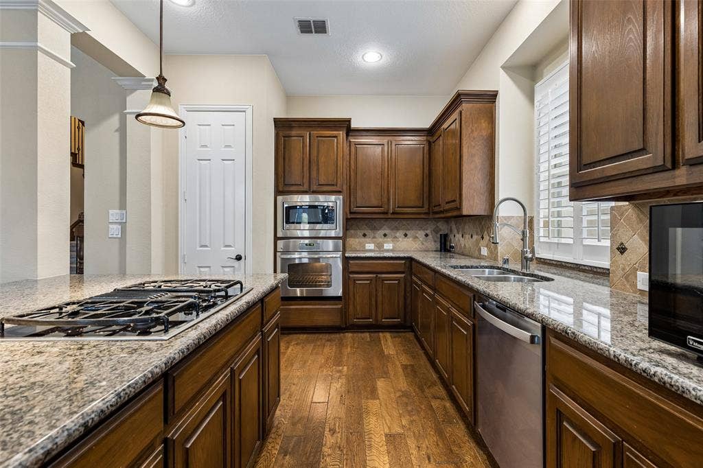7625 Ridgedale Court, Sachse, TX 75048 Great storage