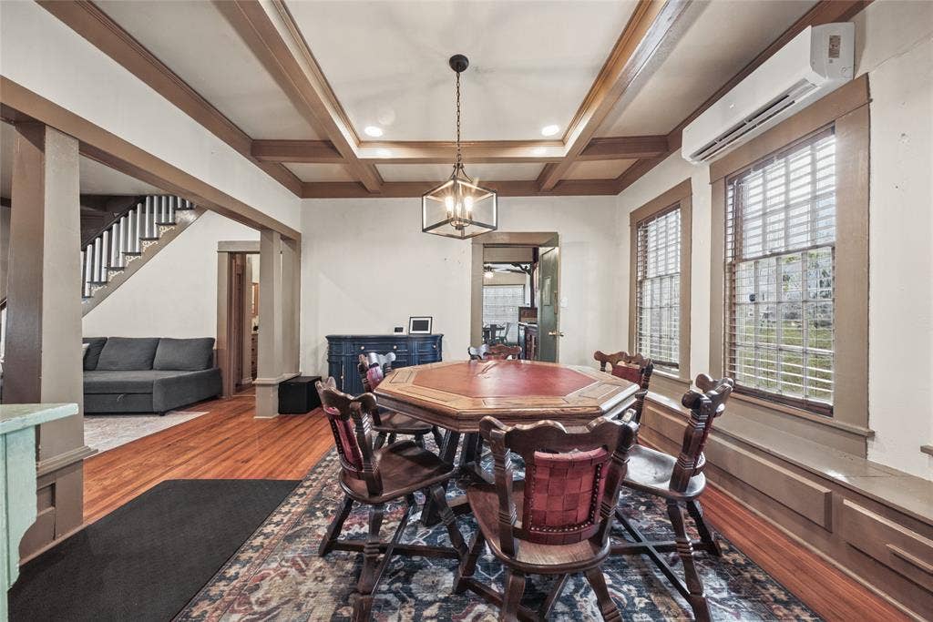406 Summit Street, Farmersville, TX 75442 Coffered ceiling featuring recessed lighting, wood-finish flooring, and a central pendant fixture with a metal frame