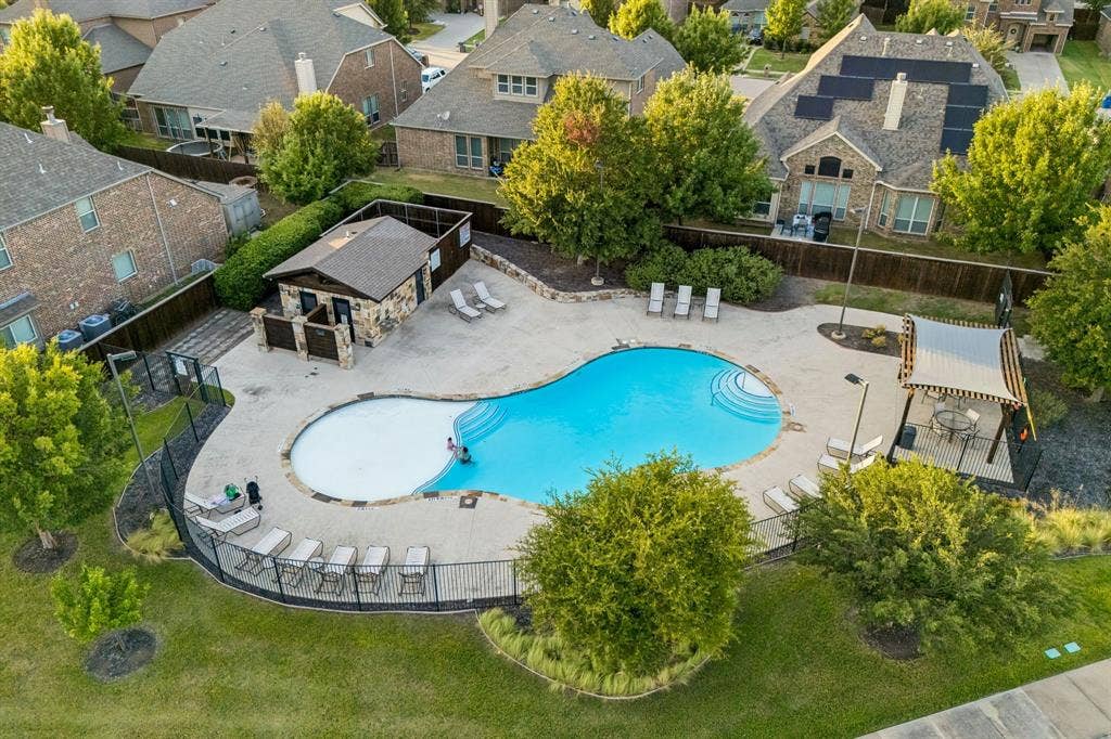 3702 Harlan Drive, Sachse, TX 75048 Community amenities include a neighborhood swimming pool for residents to enjoy.
