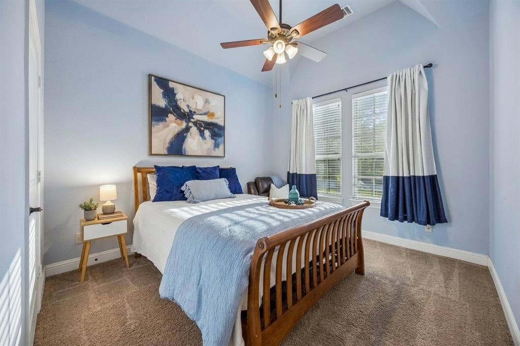 3702 Harlan Drive, Sachse, TX 75048 Third bedroom downstairs makes this floor plan especially versatile for buyers seeking multiple first-floor bedrooms.