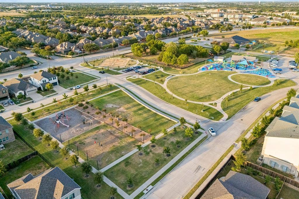 3702 Harlan Drive, Sachse, TX 75048 Wide aerial view provides perspective on the neighborhood, green space and surrounding Sachse area.