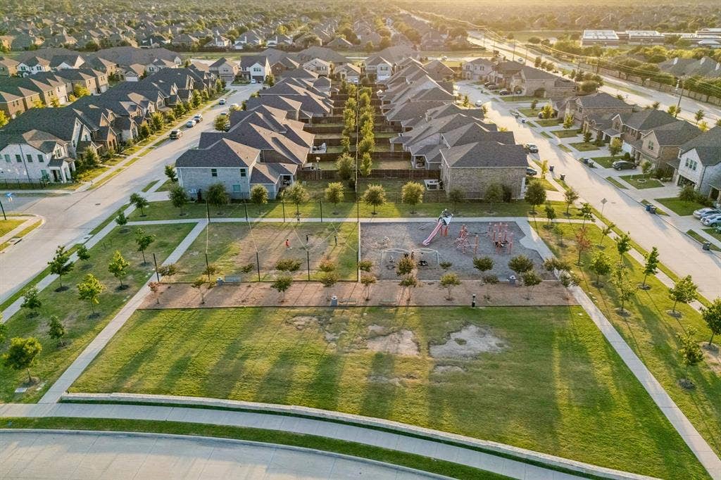 3702 Harlan Drive, Sachse, TX 75048 Aerial perspective showcases the surrounding Sachse community and convenient neighborhood setting.