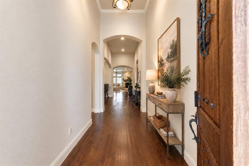 Welcoming entryway with hardwood floors