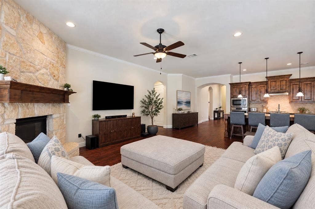 Large living room with stone fireplace