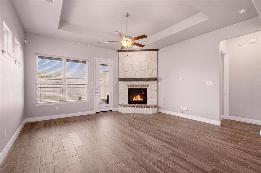 605 Brook Drive, Anna, TX 75409 gorgeous corner stone fireplace in living