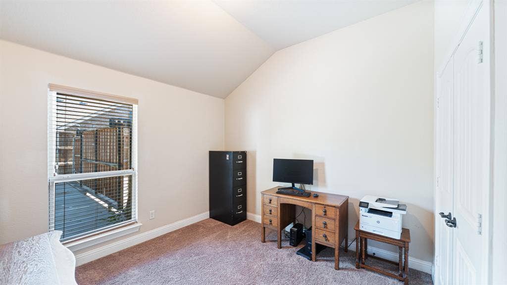 1802 Watermark Lane, Wylie, TX 75098 Vaulted ceiling, neutral wall tones, wall-to-wall carpeting, and a dual-panel closet door