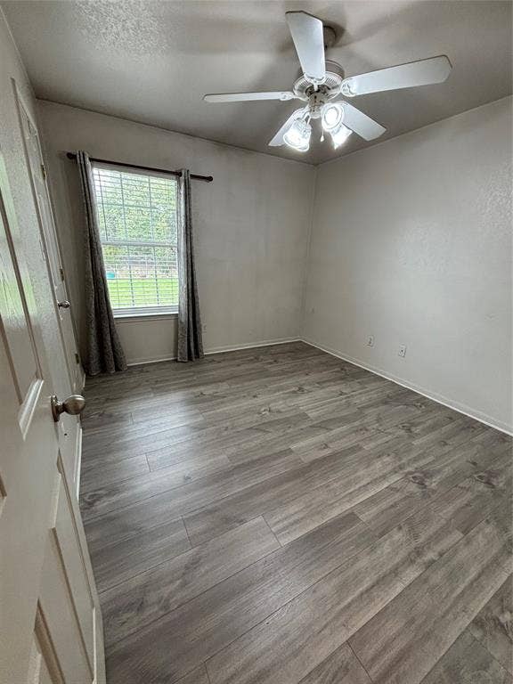 1 Mulberry Court, Morgans Point Resort, TX 76513 Wood-finish flooring, ceiling fan with integrated lighting, and single-pane window