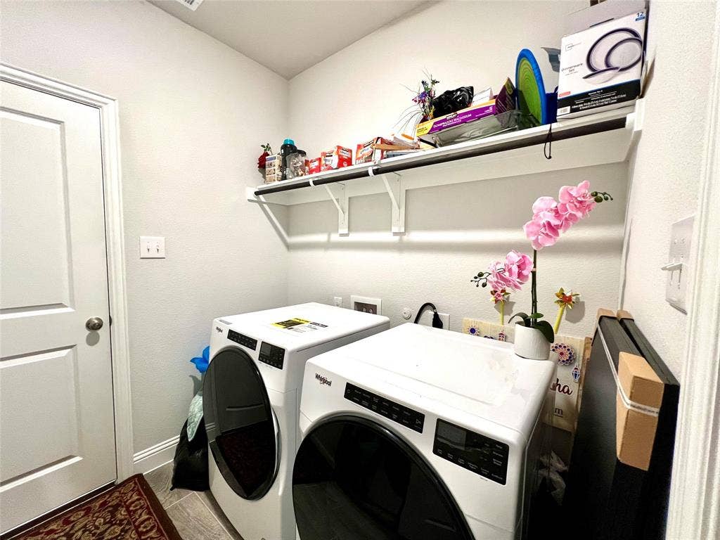 2707 Woodland Court, Wylie, TX 75098 Laundry area with independent washer and dryer