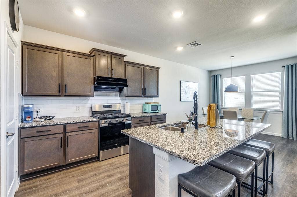 Kitchen with tons of natural light. Non furnished but some furniture is negotiable or case by case.