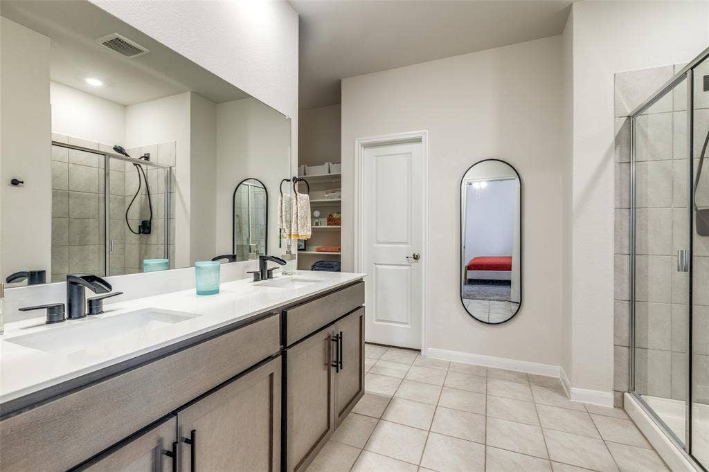 master bath with double vanities. Non furnished but some furniture is negotiable or case by case.