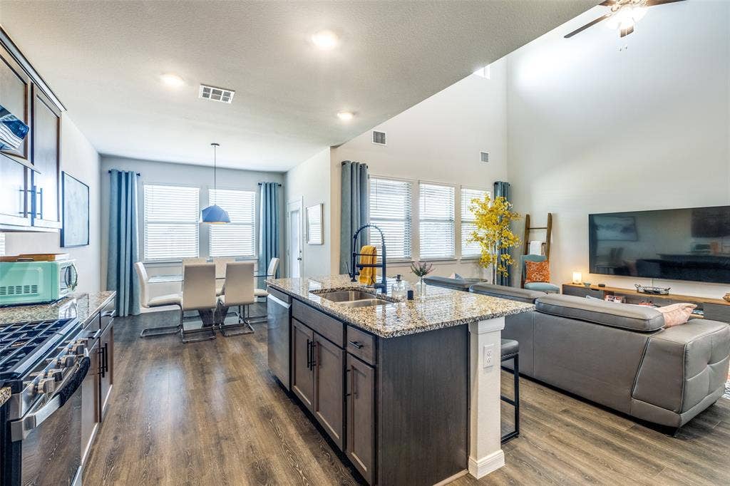 Kitchen open to living room, dining and the view of backyard.Non furnished but some furniture is negotiable or case by case.
