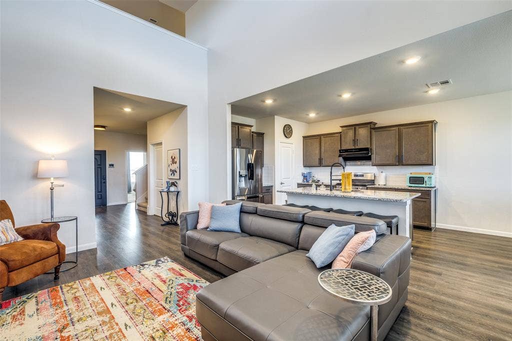 Double height living room with full windows open to the spacious backyard.Non furnished but some furniture is negotiable or case by case.