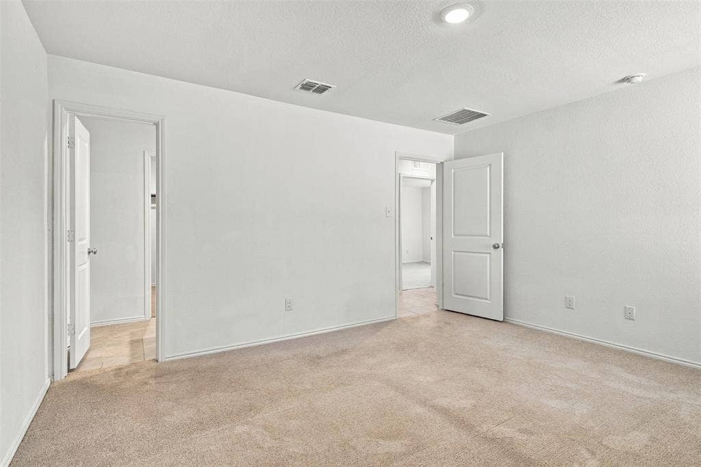 214 Harvest Street, Princeton, TX 75407 Primary bedroom as viewed from far corner.