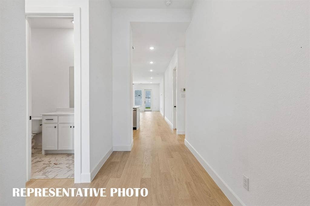 4553 Sunfish Lane, McKinney, TX 75071 Featuring sight lines from the front through to the rear of the home and ample wall space to display art work, you'll love inviting family and friends into your new dream home! REPRESENTATIVE PHOTO