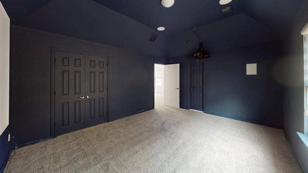 14518 Shady Grove Lane, Frisco, TX 75035 Vaulted ceiling with recessed lighting, neutral carpeting, and double-door storage