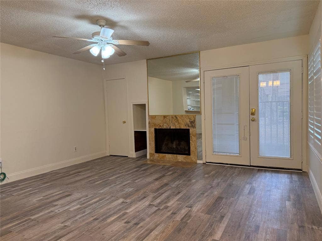 Entrance to Living Room with wood burning Fireplace and closet