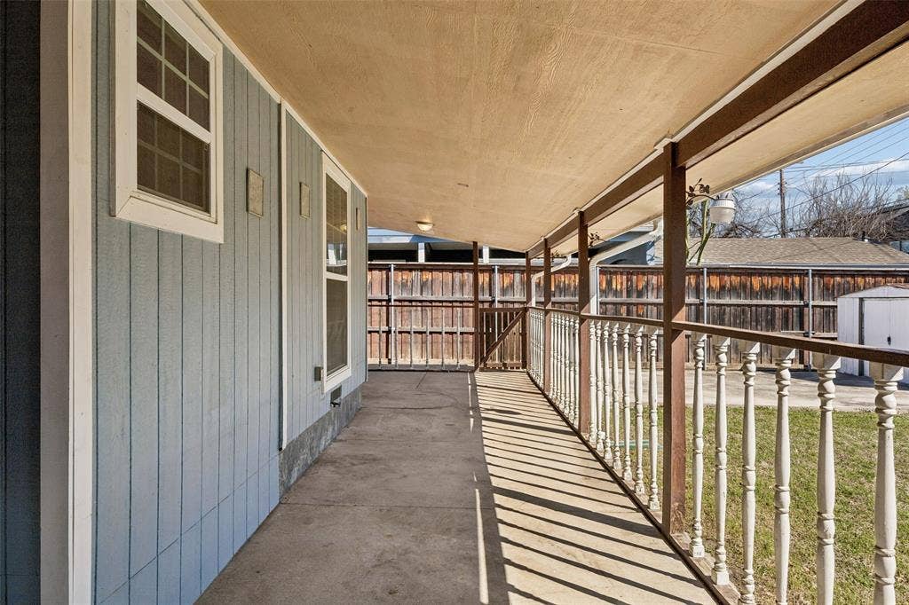Covered patio in backyard.