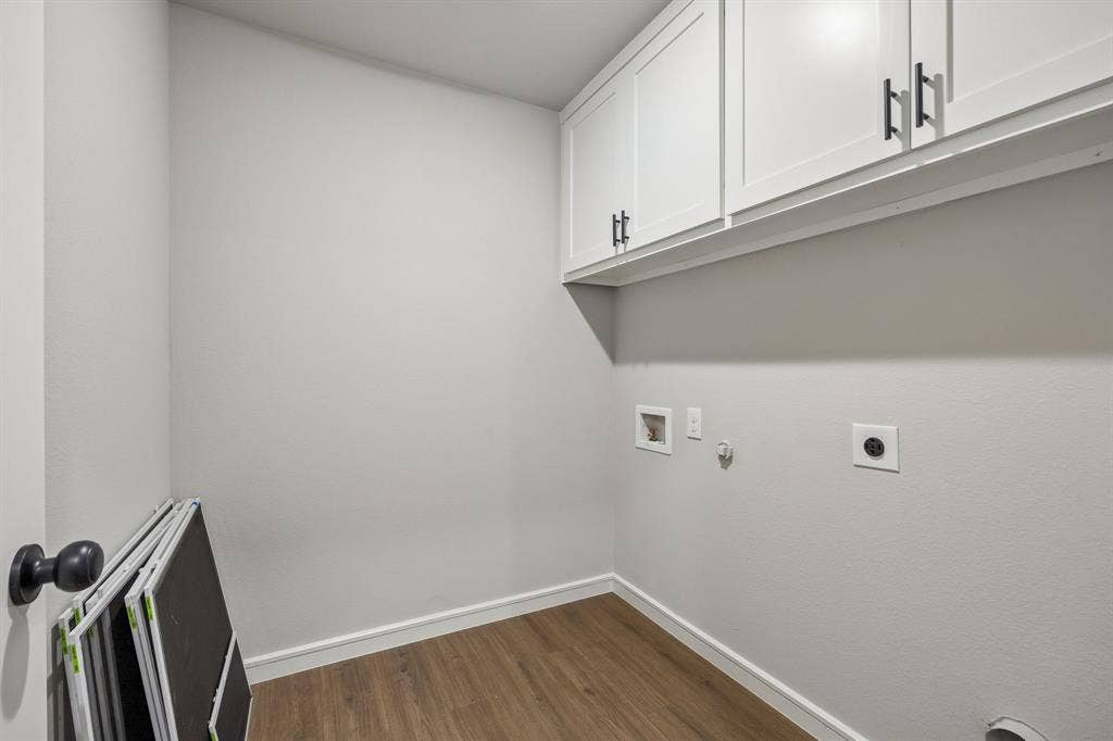 407 Frank Street, Terrell, TX 75160 407 Frank laundry room with cabinets