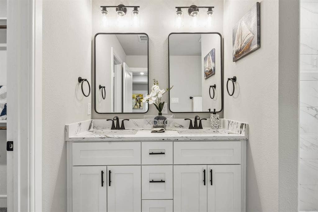 407 Frank Street, Terrell, TX 75160 407 Frank with double vanity and framed mirros