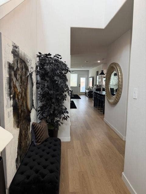2416 Adenmore Lane, Forney, TX 75126 Entryway featuring high ceilings, light-toned wood-finish flooring, and recessed lighting