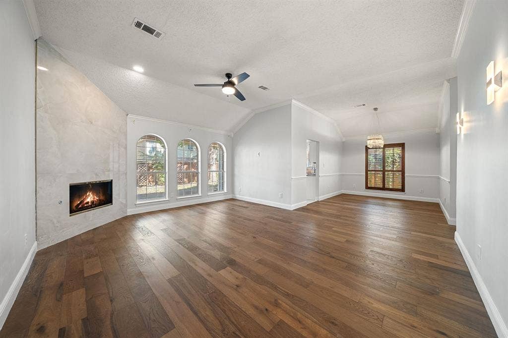 11414 Ocean Road, Frisco, TX 75035 View of living room and dining room, gorgeous wood flooring