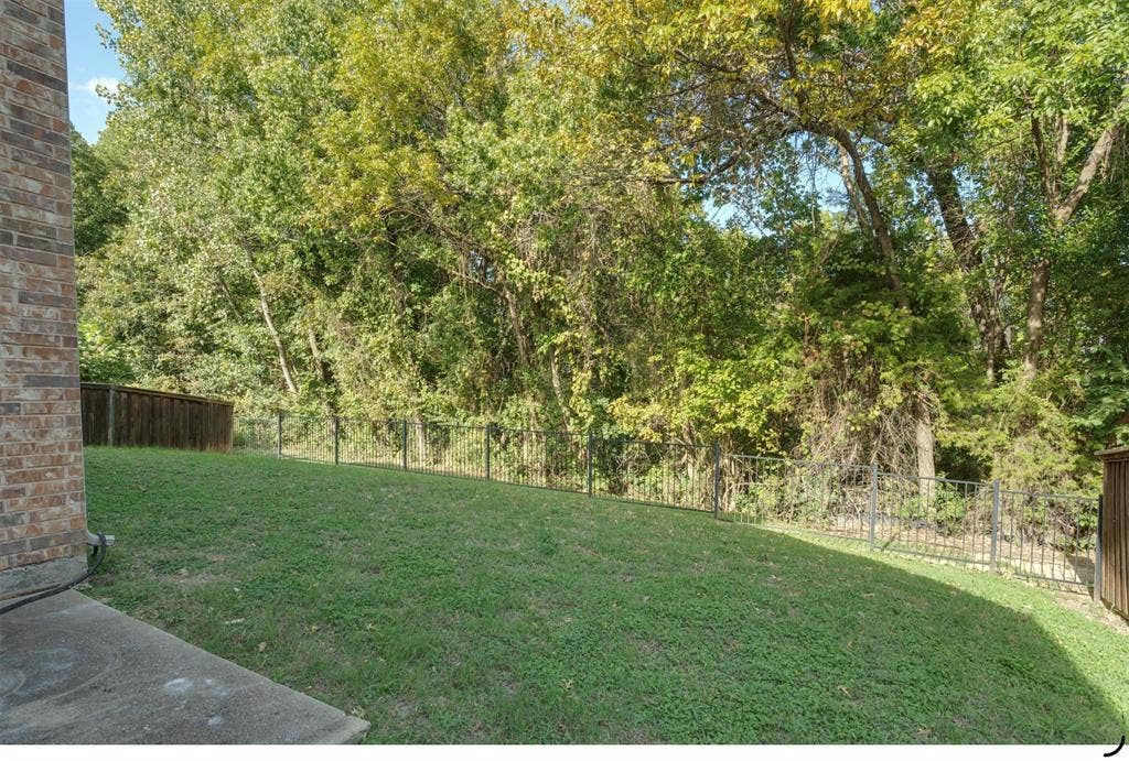 606 River Birch Trail, Garland, TX 75040 yard backs to green space