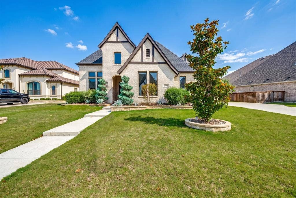 1730 Cottonwood Trail, Prosper, TX 75078 Stucco exterior featuring dark trim accents and multiple gables