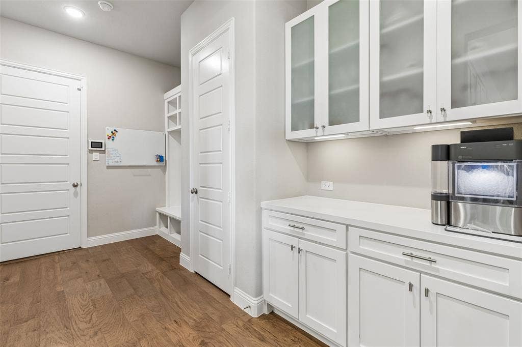 Would you look at that mudroom with added cabinetry!