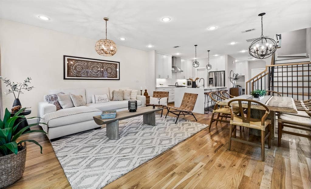 406 Parkview Avenue, Dallas, TX 75223 Living room featuring an inviting chandelier, and light hardwood / wood-style floors