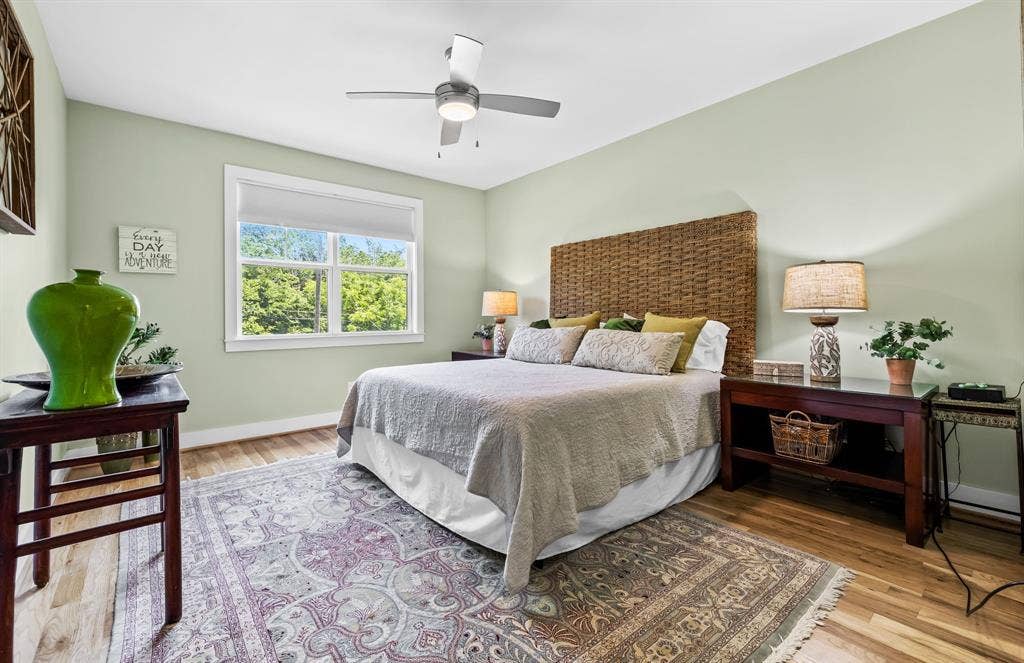 406 Parkview Avenue, Dallas, TX 75223 Bedroom with ceiling fan and hardwood / wood-style flooring