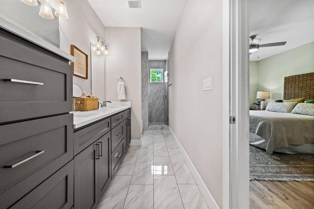 406 Parkview Avenue, Dallas, TX 75223 Bathroom with ceiling fan, tile flooring, and double vanity