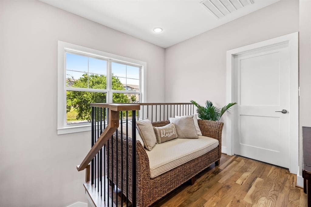 406 Parkview Avenue, Dallas, TX 75223 Living area featuring a healthy amount of sunlight and light wood-type flooring