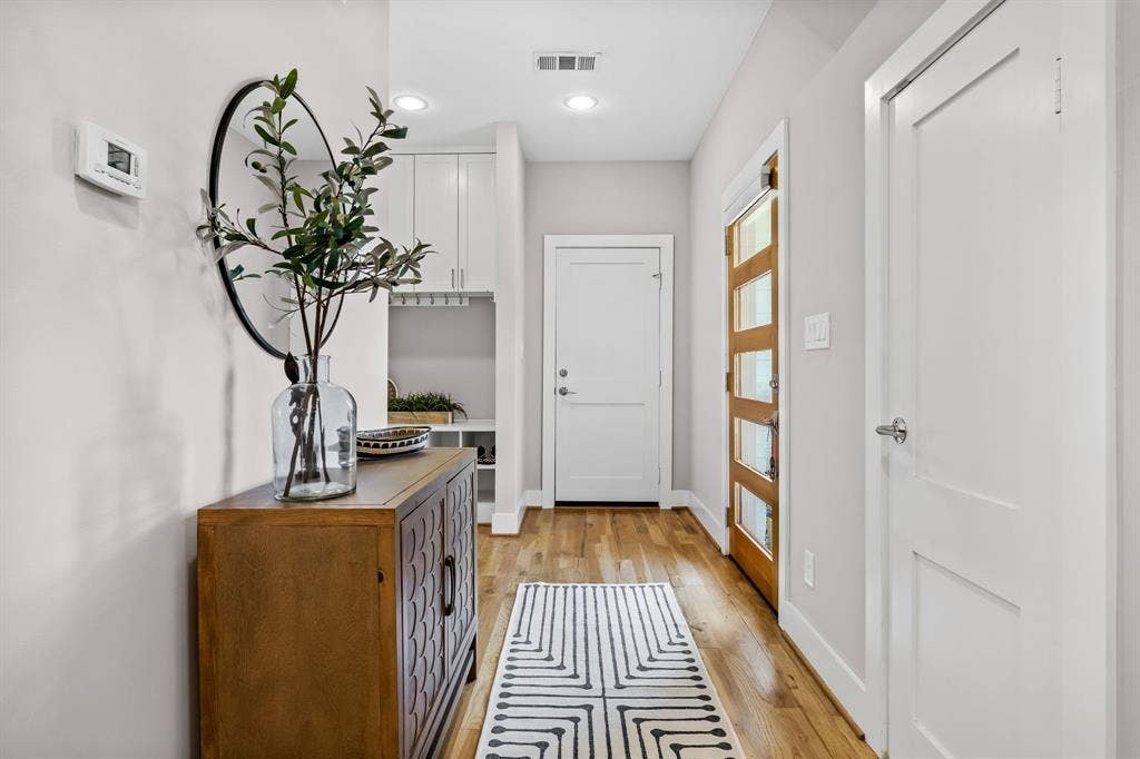 406 Parkview Avenue, Dallas, TX 75223 Entryway with light hardwood / wood-style floors