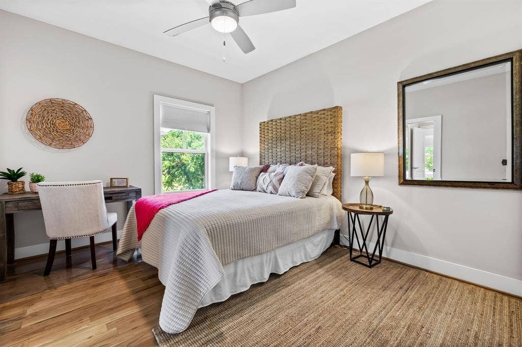 406 Parkview Avenue, Dallas, TX 75223 Bedroom featuring ceiling fan and light wood-type flooring
