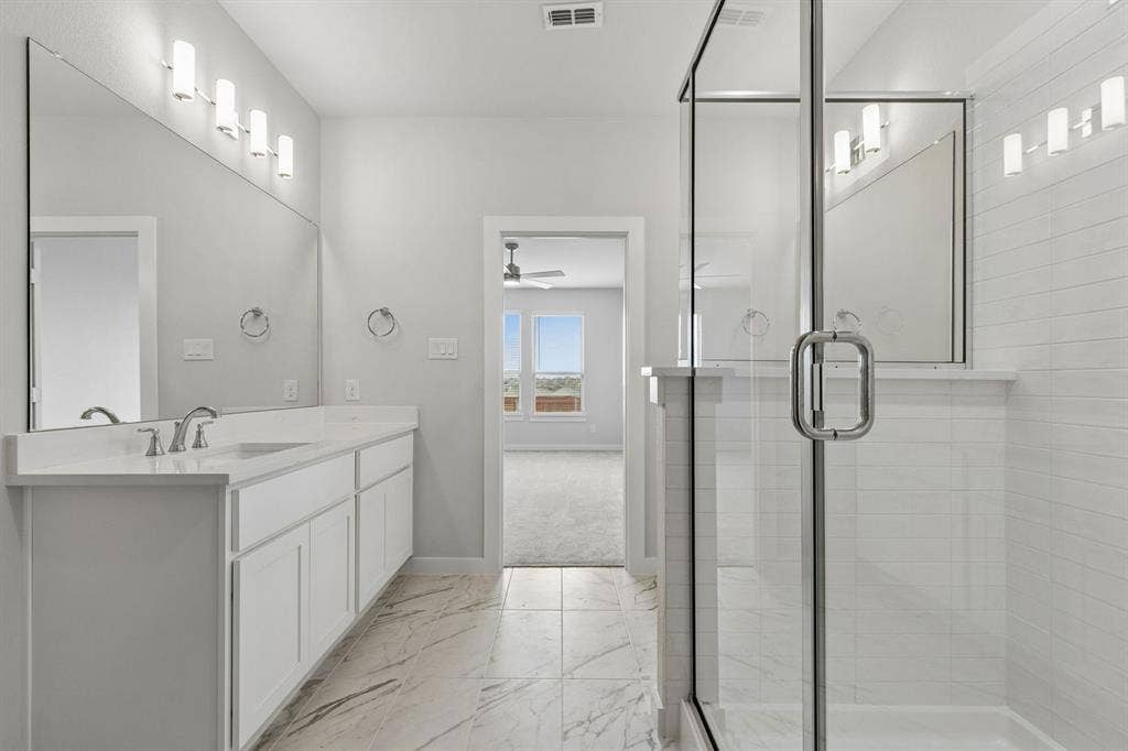 4724 Carina Road, McKinney, TX 75071 Primary Bathroom in the Winters home plan – REPRESENTATIVE PHOTO