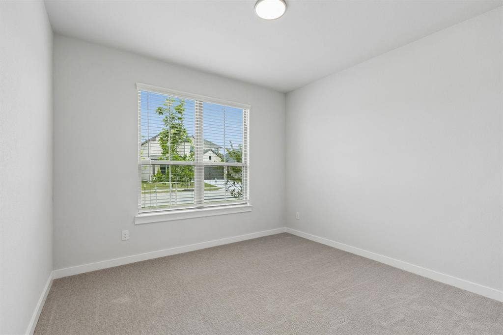 4724 Carina Road, McKinney, TX 75071 Bedroom in the Winters home plan – REPRESENTATIVE PHOTO