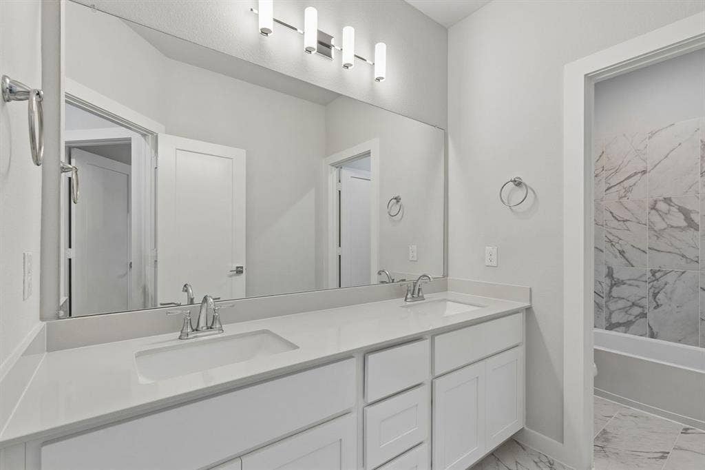 4724 Carina Road, McKinney, TX 75071 Bathroom in the Winters home plan – REPRESENTATIVE PHOTO