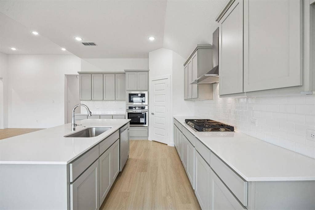 Kitchen in the Gilmour II home plan – REPRESENTATIVE PHOTO