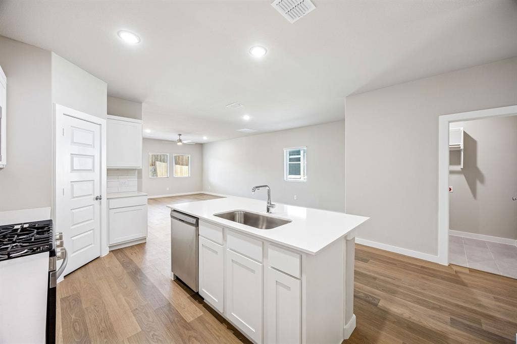 1100 Old Stead Drive, Princeton, TX 75071 Kitchen in the Willow home plan – REPRESENTATIVE PHOTO