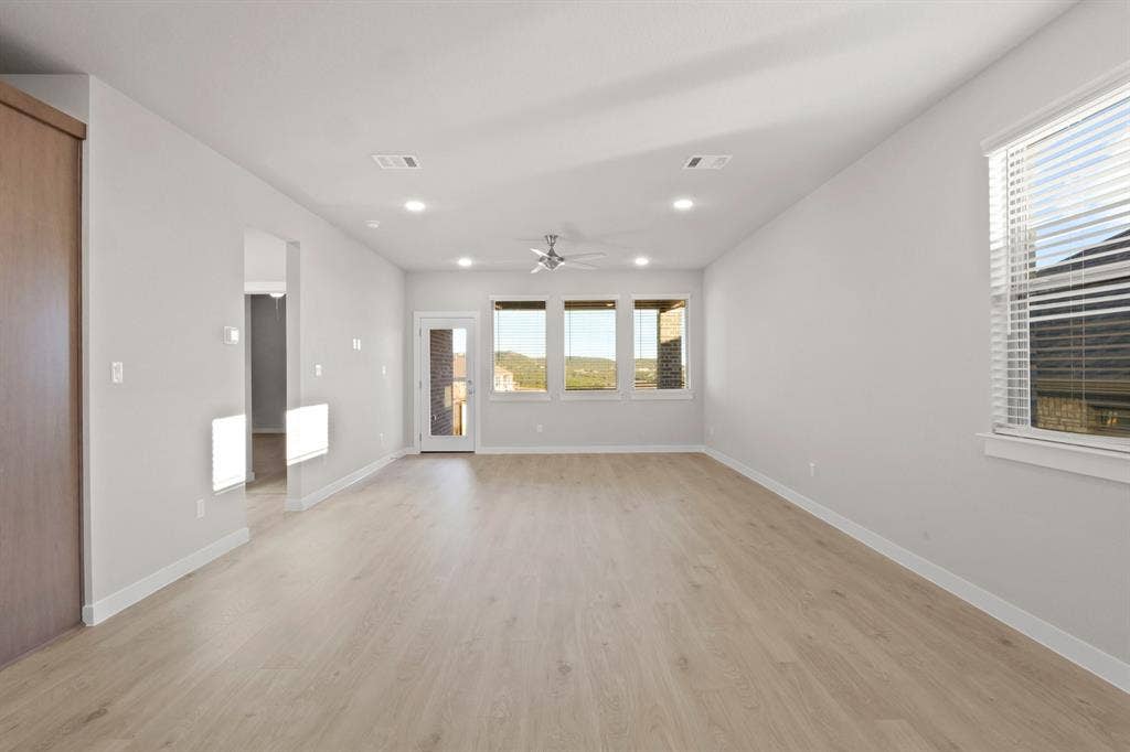 1100 Old Stead Drive, Princeton, TX 75071 Living Room in the Willow home plan – REPRESENTATIVE PHOTO