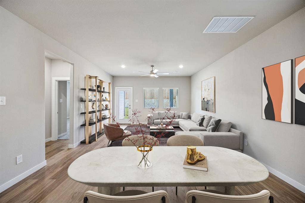 1100 Old Stead Drive, Princeton, TX 75071 Living and Dining Room in the Willow home plan – REPRESENTATIVE PHOTO