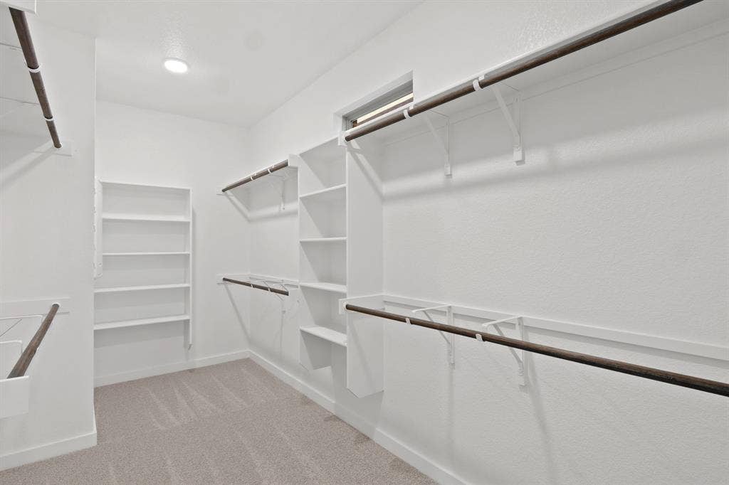 1100 Old Stead Drive, Princeton, TX 75071 Primary Closet in the Willow home plan – REPRESENTATIVE PHOTO