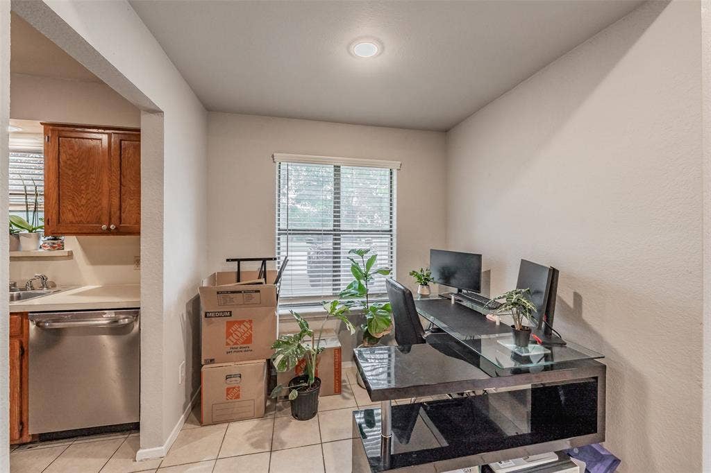 1128 Neutral-toned walls, recessed ceiling lighting, tile flooring, and horizontal window blinds