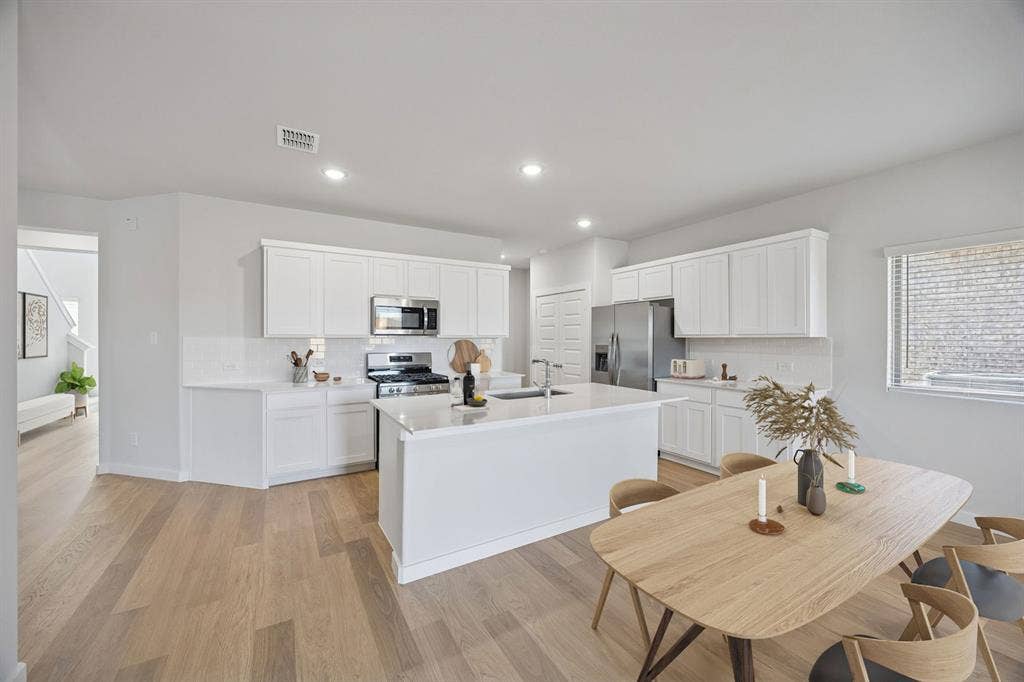 Kitchen in the Oak II home plan – REPRESENTATIVE PHOTO