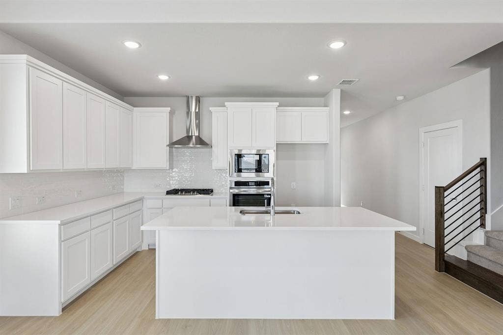 Kitchen in the Stanley II home plan – REPRESENTATIVE PHOTO