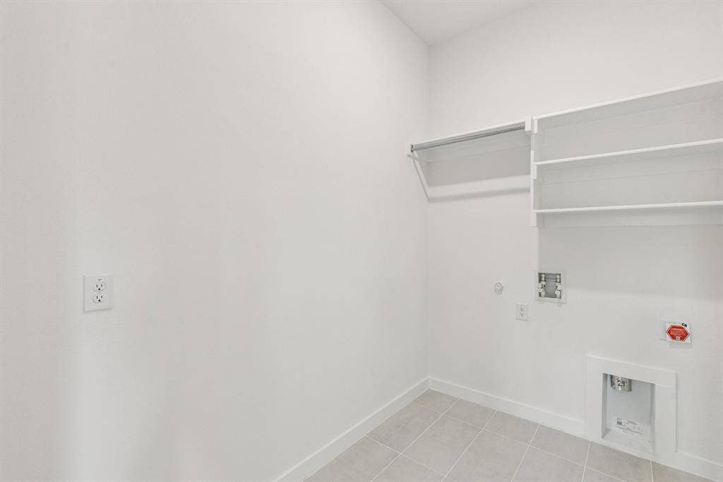 4736 Carina Road, McKinney, TX 75071 Utility Room in the Da Vinci II home plan – REPRESENTATIVE PHOTO